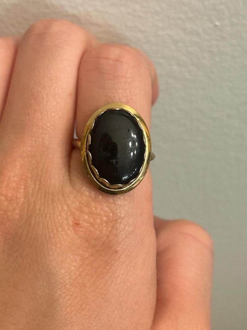 Black onyx ring with gold accents